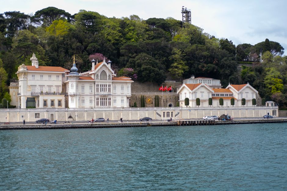A mansion by the Bosphorus strait in Istanbul surrounded by greenery